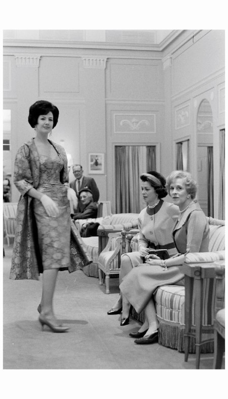 Designer, Sophie Gimbel, of Saks Fifth Avenue, viewing model w. customer Nov 1960 Peter Stackpole